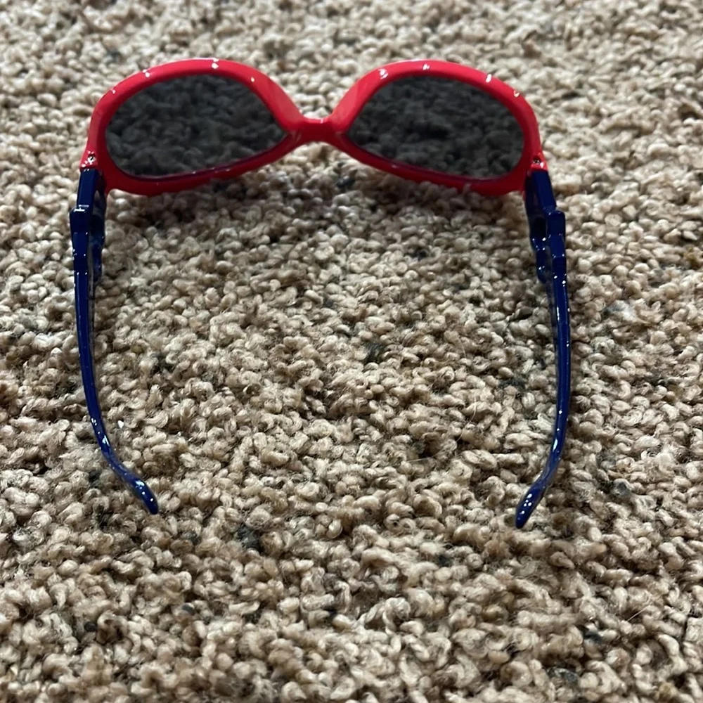 2 pair kids sunglasses and 1 case.